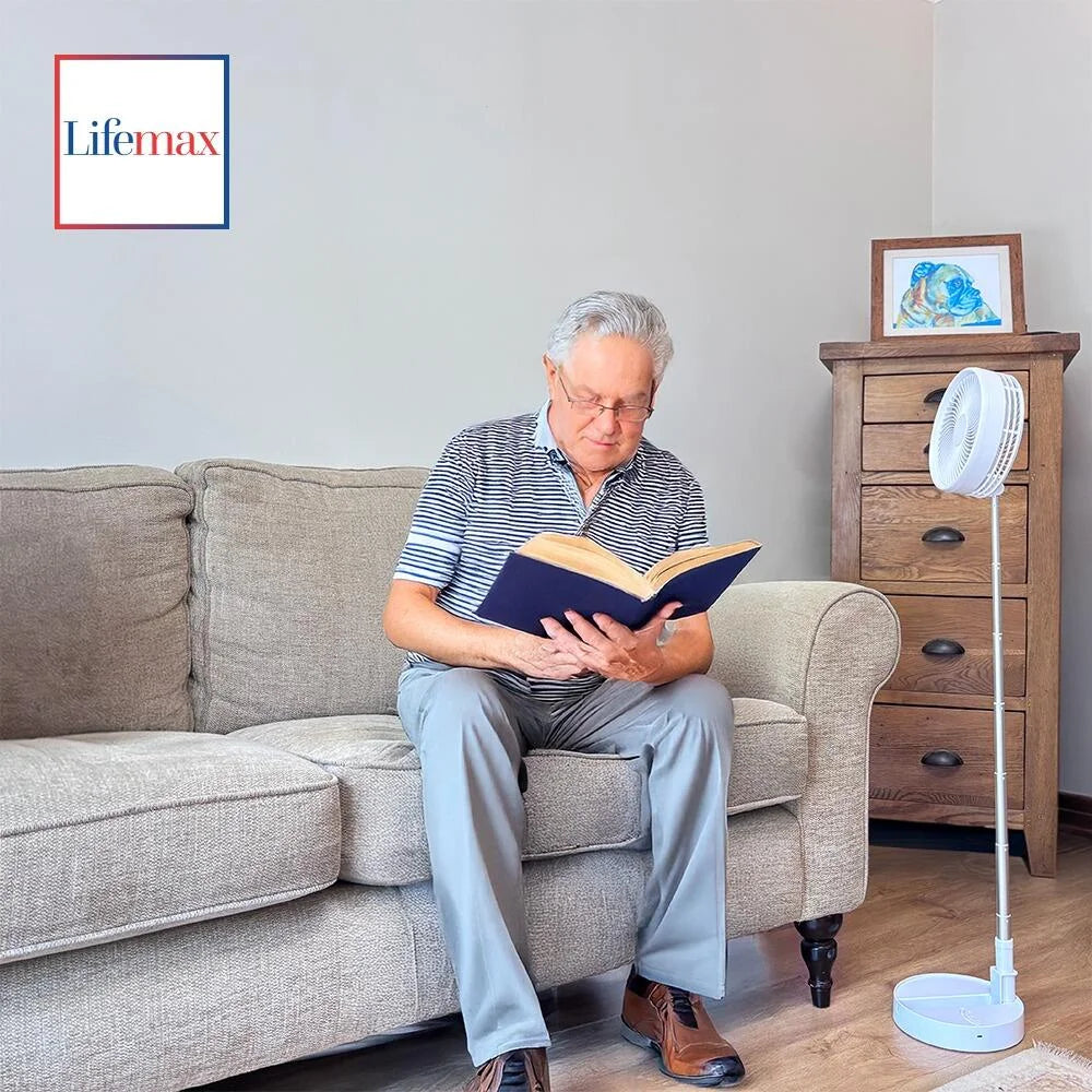Cooling FAN in use wth man reading book