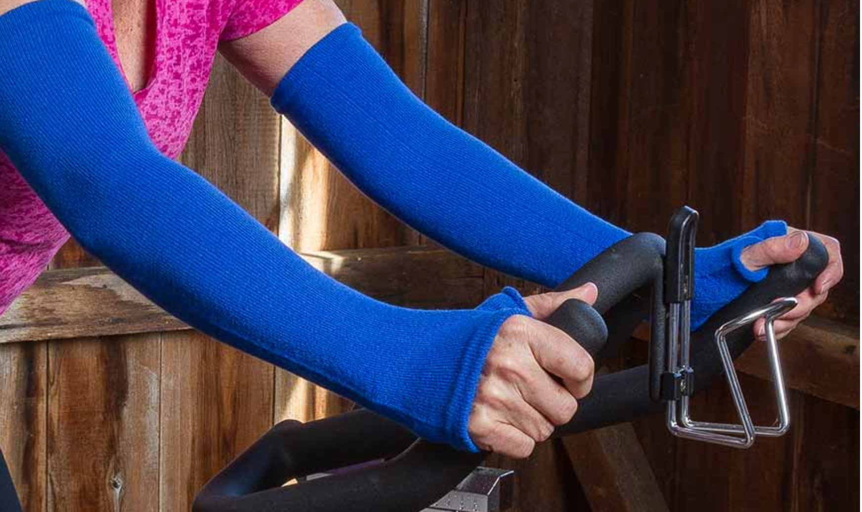Limbkeepers are non compression garments and shown here is a person using the arm sleeves whilst exercising to protect their arms from bumps and bruises and knocks which can cause very painful injuries