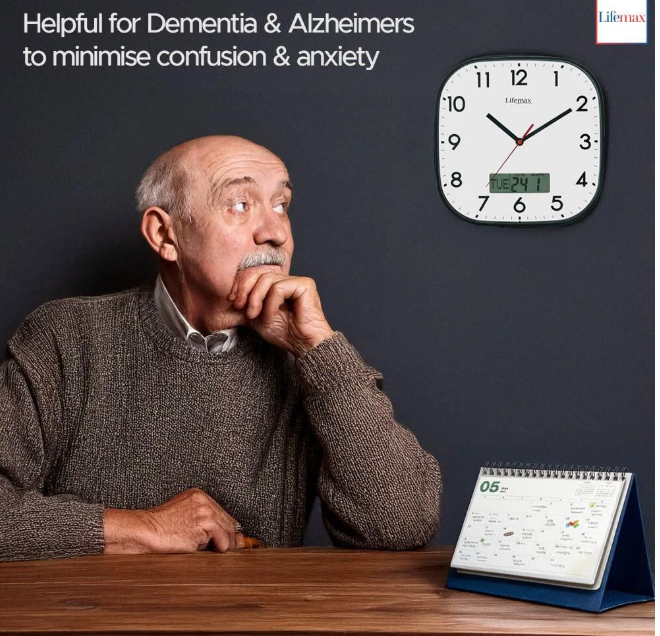 Man sitting at a table with a clock and calendar, text indicating helpfulness for Dementia & Alzheimer's.